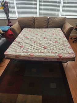 Three seater Sofa with pull-out queen bed