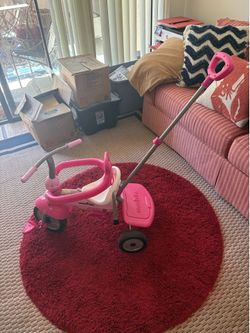 Pink smarTrike Breeze 3-1 toddler tricycle