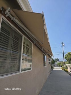 Aleko Electric white frame awning
