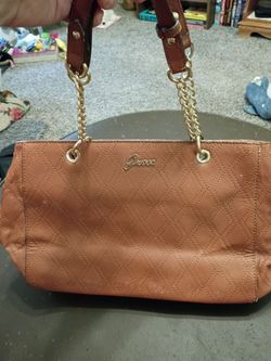 Used Guess brand brown satchel shoulder bag with chain straps.