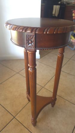 Round Wood Accent Table with Carved Detail