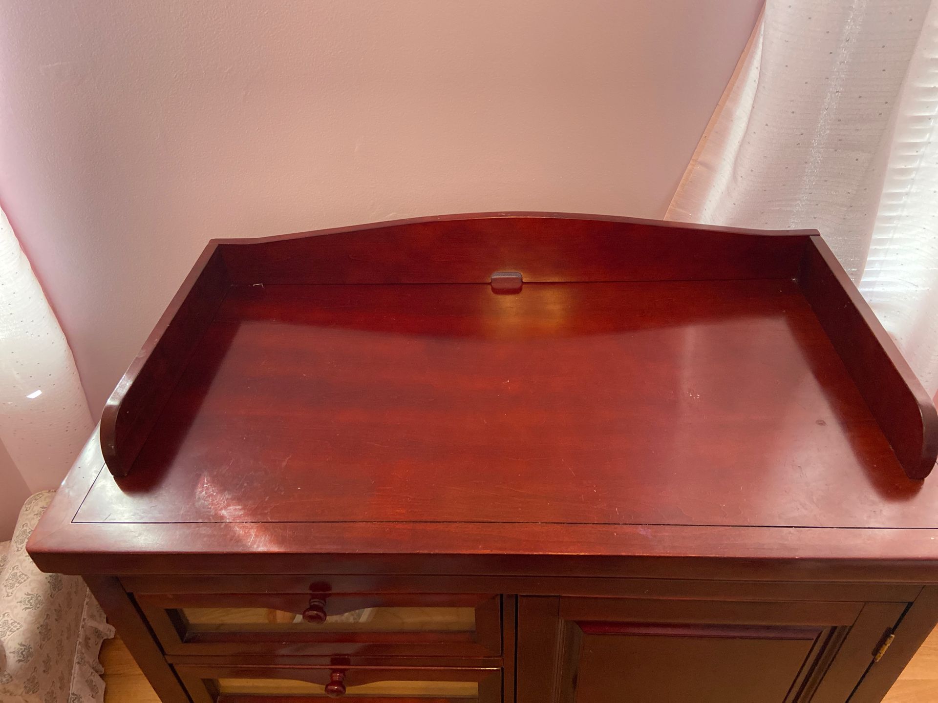 Cherrywood dresser with cabinet and changing top