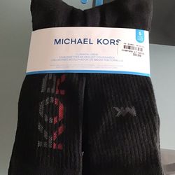  NEW~MEN’S~MICHAEL KORS~ Cushion Crew Socks~5 pairs of black~One size~Pick up Four Mile Cove Parkway behind Walmart on Del Prado