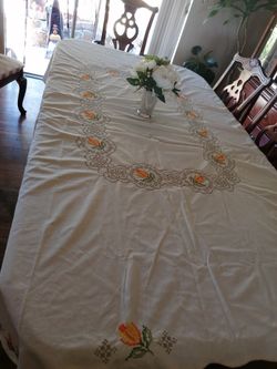 Like new table cloth 75inch width by 7 ft long