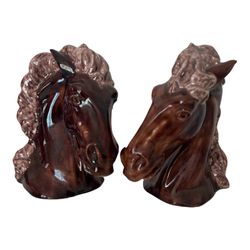 Pair Of Vintage Hand Painted Horse Head Bookends or Wall Decor  A hole is on the bottom to hang horse heads.  Approximate size 8" X 6"  Please see pho