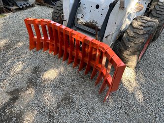 Skid steer dozer root rake
