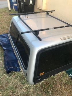 Nissan 6 foot Bed LEER Camper Shell Excellent Silver