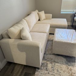 Brand New Cream Sectionals With Free Ottoman 