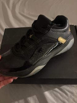 Air Jordan 11 Low Black Gold Sneaker