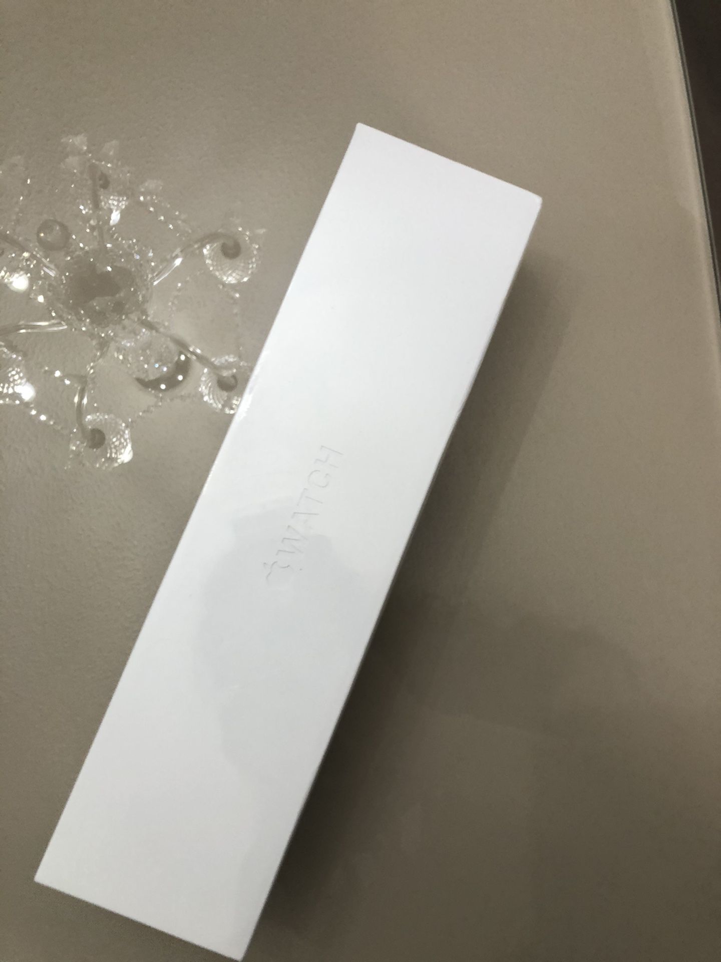 Apple Watch Series 5, 40MM Silver Aluminum Case with Sport Band.