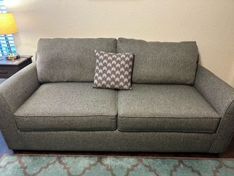 Upholstered queen sofa sleeper