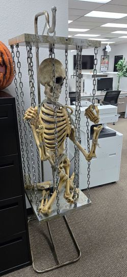 Halloween skeleton in a cage
