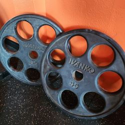 PAIR OF 45 LBS OLYMPIC IVANKO RUBBER COAATED PLATES ( EXCELLENT CONDITION  )