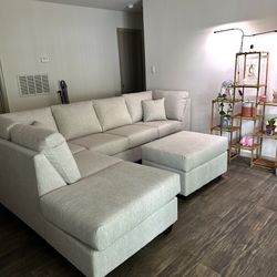 Light Gray Sectional With Ottoman 
