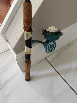 Penn 722 Spinning Reel with Cork Handle Rod