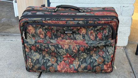 Floral tapestry suitcase with wheels $10  pick up only bonanza and lamb