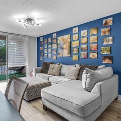 Gray L Sectional Couch Sofa With Pillows And Ottoman From Rooms To Go 