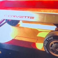 A 70’s vintage pull wagon I cheaply painted it like a Corvette themed wagon and found some Vette looking wheels for it.  Looks pretty cool!  Needs $