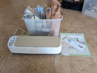 Cricut Maker 1 with vinyl, tools, cutting mat, accessories