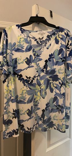 white top with blue and yellow floral print from Calvin Klein.