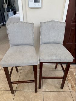Pair of Grey Fabric Nailhead Bar Stools
