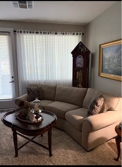 Beige Upholstered Sofa with Rolled Arms