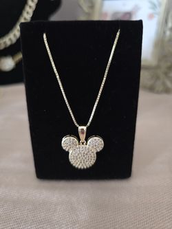 Dije de disney con cadena de oro laminado