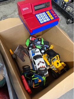 Box of toys! All in fair condition! Construction truck! Razor and police car have lights and sound, move with button!
