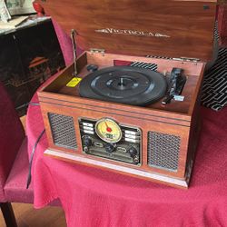 Phonograph Player, With Radio , CD,and Cassette Player.