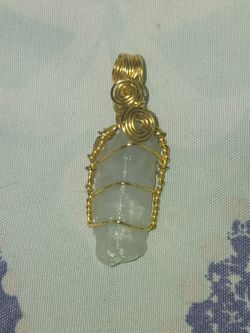24kt gold wrapped crystal pendant