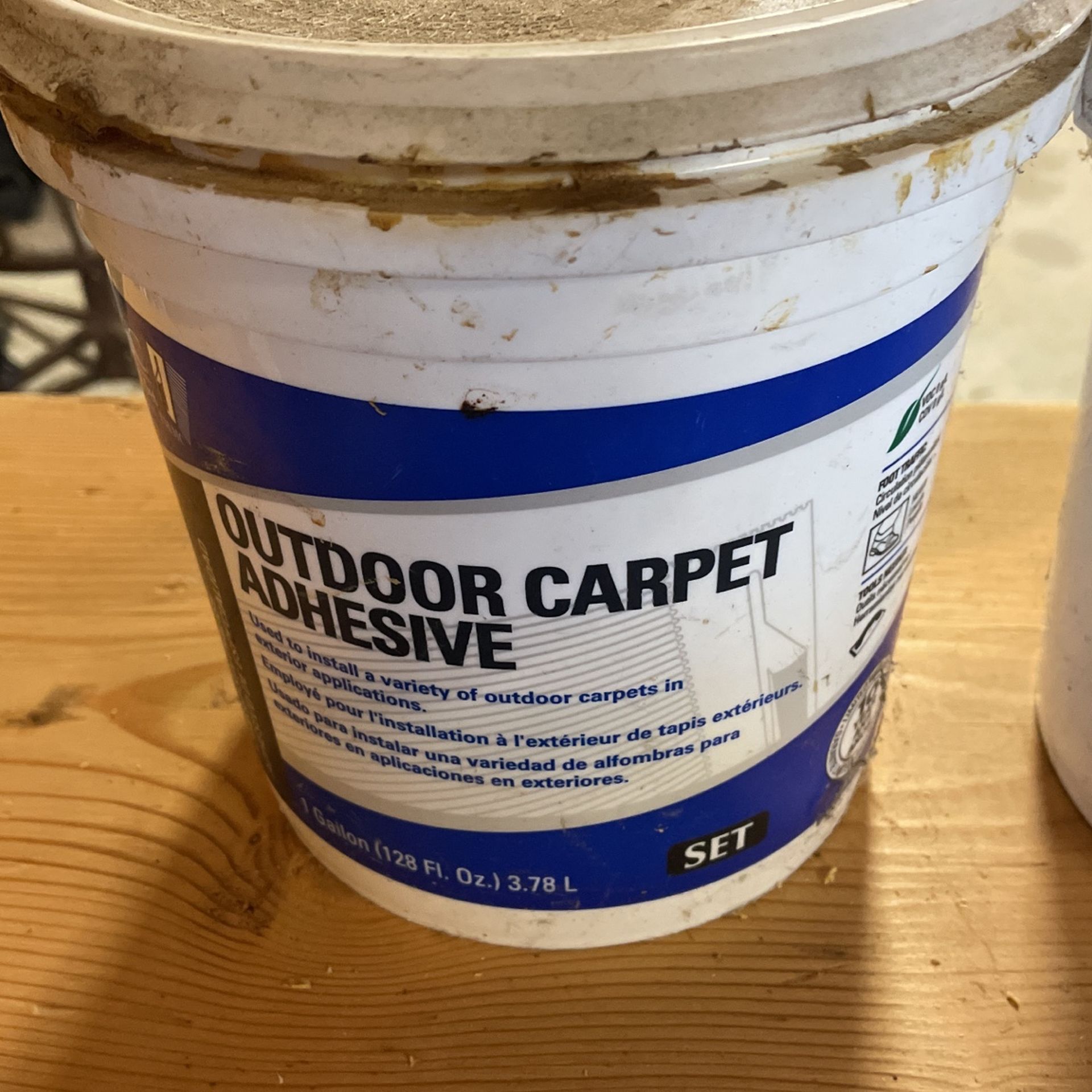 Outdoor carpet adhesive