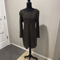 Black and gold dress with a geometric pattern. Size L #glamour #party #eveningwear Length 34” In excellent condition