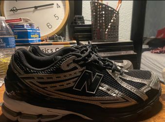 Black and Silver New Balance Shoes