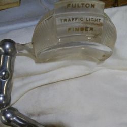 Fulton Traffic light finder. It's very old. Text (contact info removed)