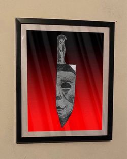 Michael Myers knife reflection art piece on black frame