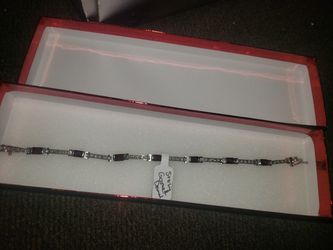 Sterling silver bracelet with diamonds and garnet. Make offer