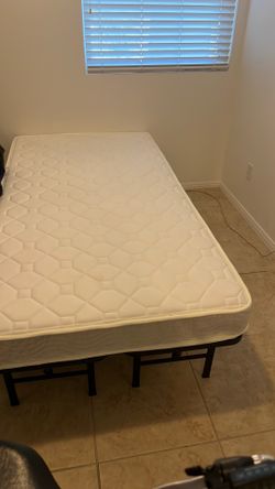 Twin bed with mattress
