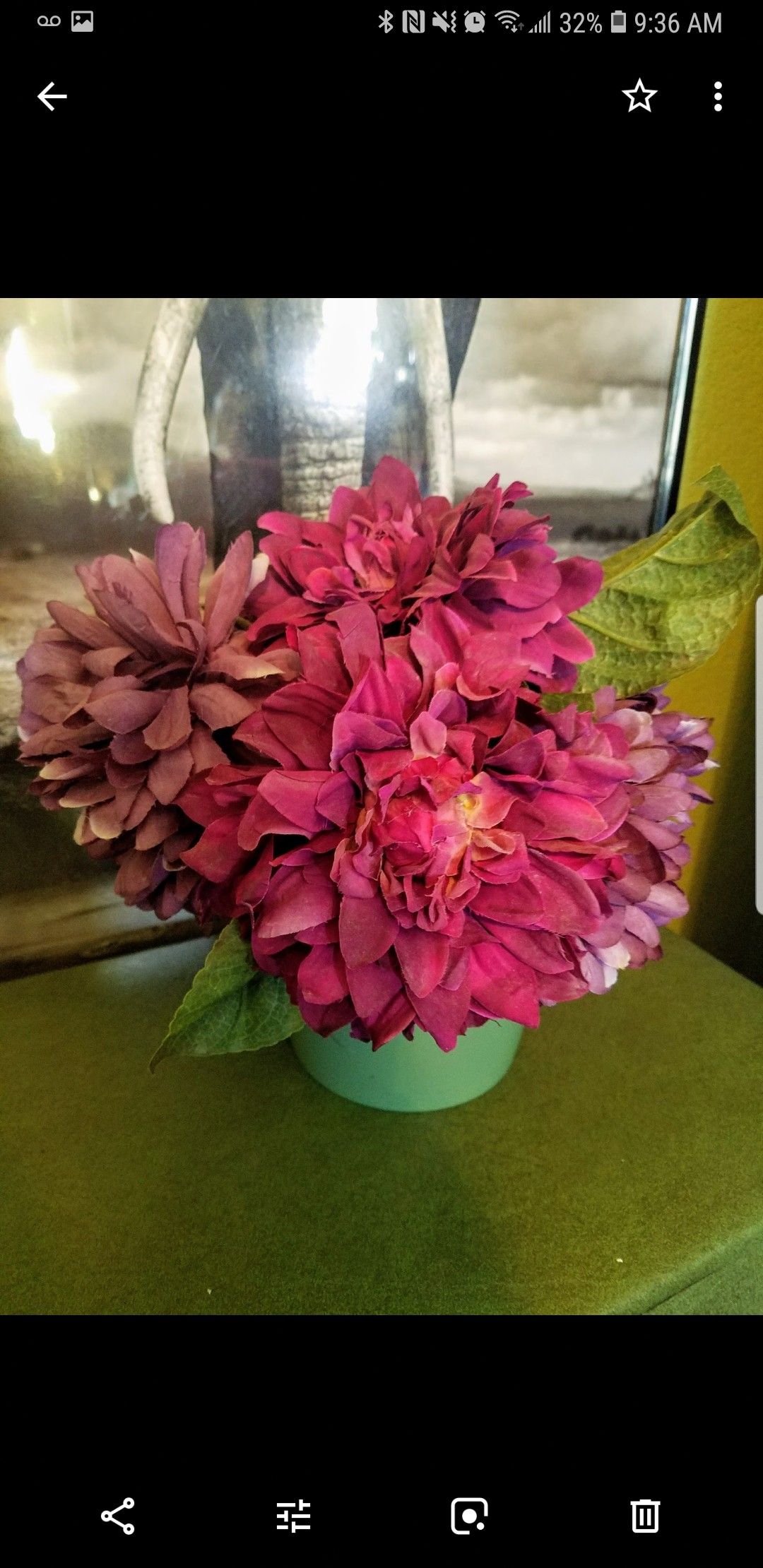 Small purple and green pot flower centerpiece