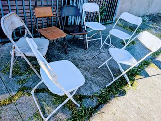Seven folding chairs in good condition
