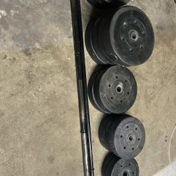 Weight Set With 2  Big Bars   2 -25lbs 4 -20 Lbs 2 15 Lbs 2 15 Lbs 3 10 Lbs 2 7.5lbs 3 2.5 Lbs