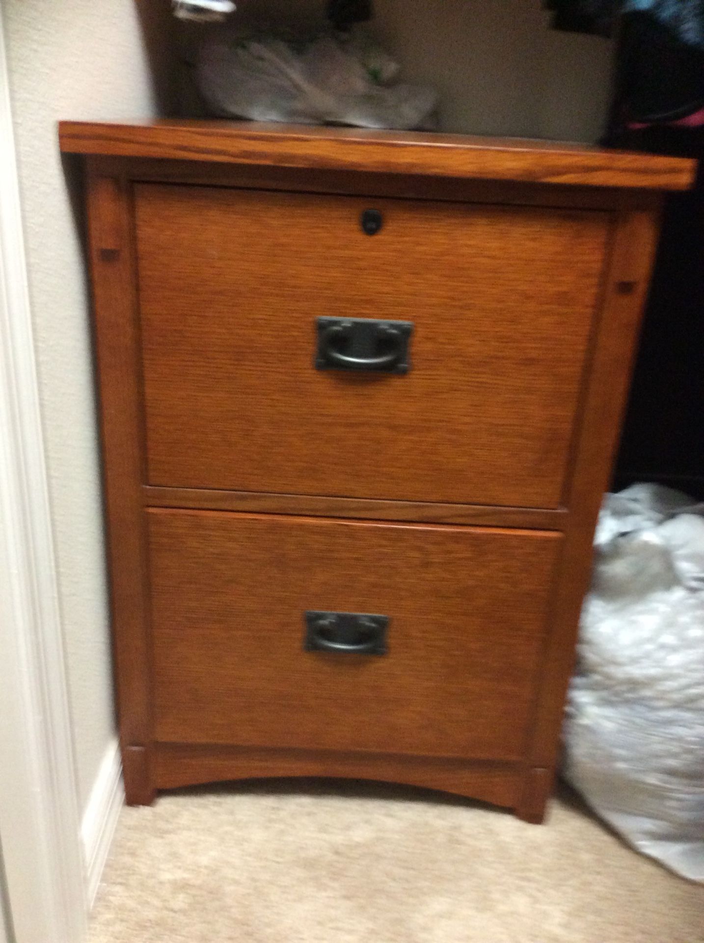 Wood file cabinet. Excellent condition.