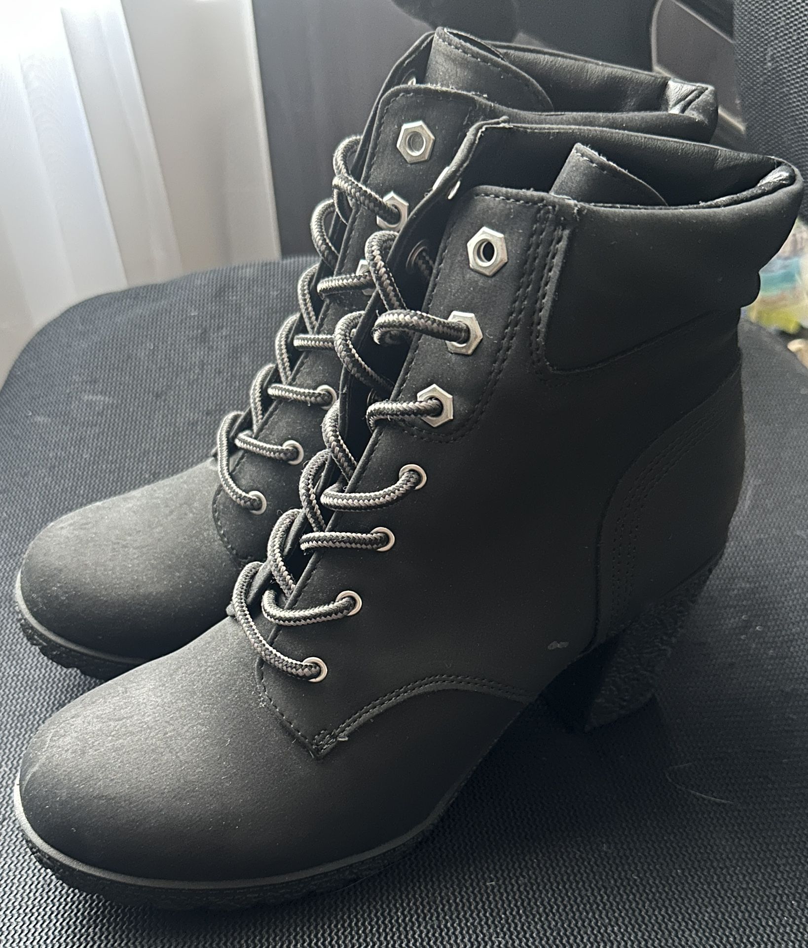 Woman’s Lace Up Booties