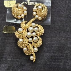 Trifari earrings and a brooch With Tags Attached