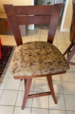 Solid wood swivel cushioned bar stools