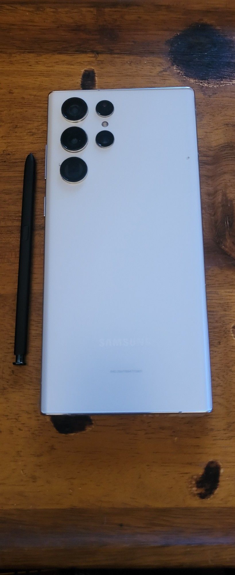 6)GALAXY S22 ULTRA. WHITE. HAS A HUGE 512GB HARDDRIVE AND 12GB RAM. CARRIER UNLOCKED. SCREEN HAS A small BLACK DOT ON UPPER LEFT SIDE. DOES NOT EFFECT