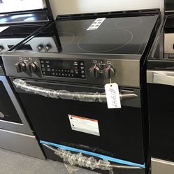 New Scratch And Dent Frigidaire Gallery 5 Burner Glass Top Black Stainless Steel Slide In Range. 1 year Warranty 