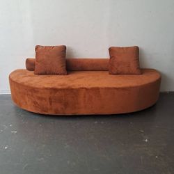 Custom Backless Sofa with Pillows. 96 W x 37 D x 40 H.