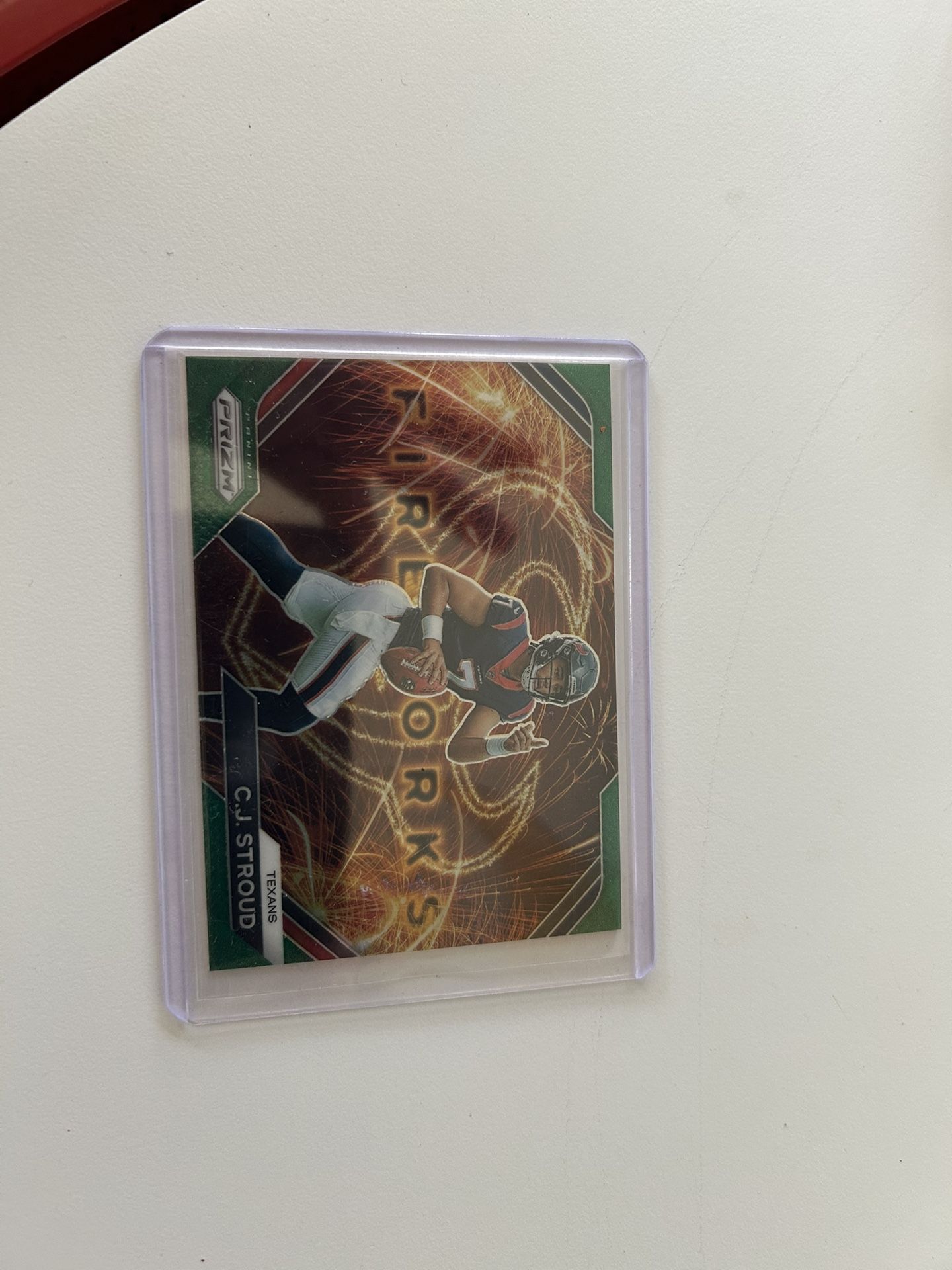 2023 Panini Prizm Fireworks Green Wave rookie card of C.J. Stroud from the Houston Texans.