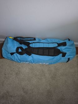 a blue carrying bag for a portable 7'x7' pop-up sun shelter or beach canopy designed for outdoor recreation and camping 🏕.