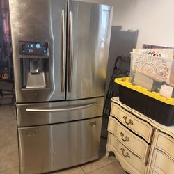 Samsung French door refrigerator freezer. Measurements are 35 1/2 x 68 if it’s a large refrigerator.